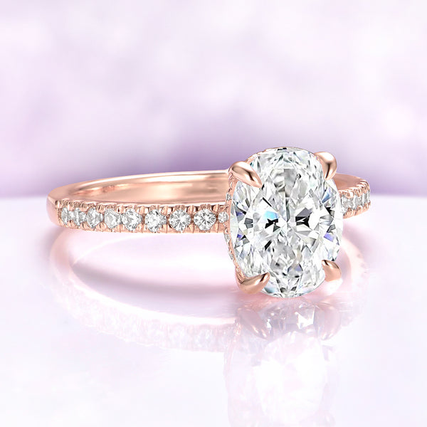 Oval Lab-Grown Diamond Hidden Halo Solitaire Engagement Ring in 14K Solid Rose Gold (IGI Certified) by Aquamarise Gold, featuring a pavé diamond band in a delicate hidden halo setting.