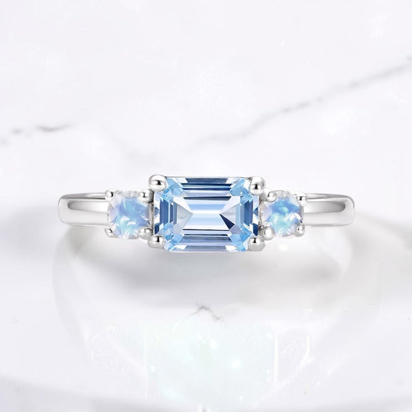 East west set engagement ring by Aquamarise shown in a ring style banner