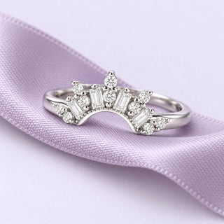 Sterling-silver Art Deco crown band with clear baguette and round stones, resting on a continuous lavender silk ribbon.