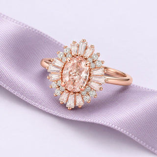 Rose-gold Victoria ring with a peach morganite center and Art Deco halo, resting on continuous dusty lavender silk.