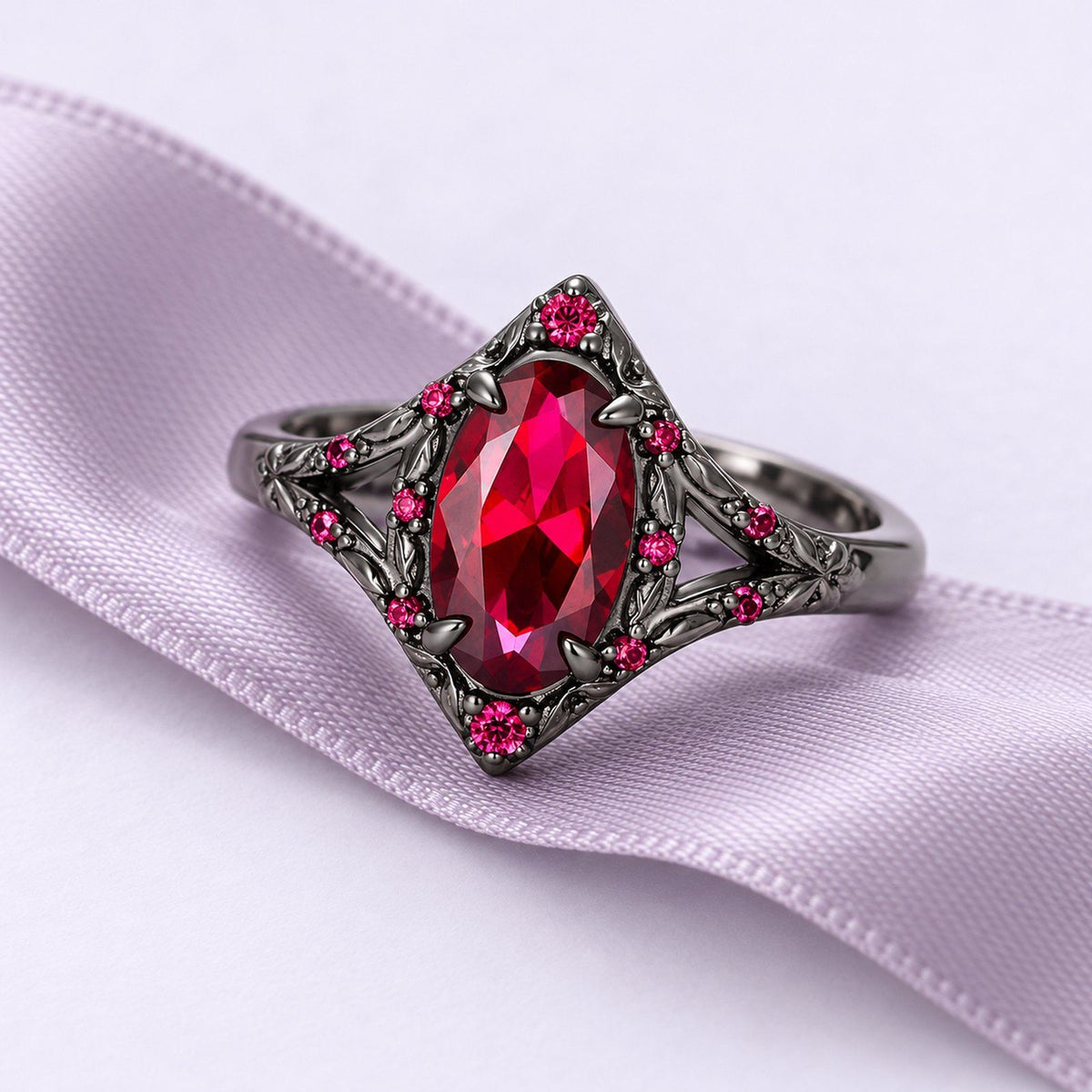 Nerida ruby ring in dark ornate metal with red accent stones, resting at a gentle angle on a long lavender silk ribbon.