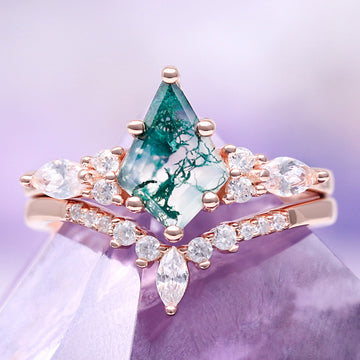 Skye Kite® Green Moss Agate Engagement Ring Set in 14K Solid Rose Gold by Aquamarise Gold, featuring a kite-cut moss agate center and sparkling accent stones on rose gold bands.