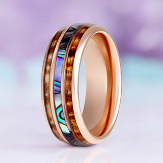 Abalone shell and whiskey barrel wood men's wedding band in rose gold tungsten