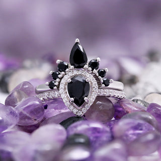 Black onyx pear solitaire with matching sterling silver curved wedding band
