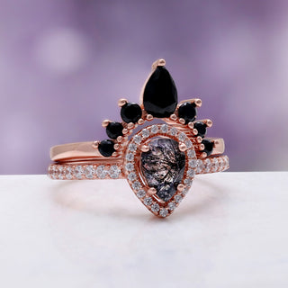 Amy Rutilated Quartz & Black Onyx Ring Set in 14K Rose Gold by Aquamarise, a pear-cut rutilated quartz with a black onyx marquise crown band.