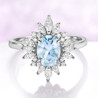 Aurora Oval Halo Aquamarine Ring in Sterling Silver with a 1.4 carat oval aquamarine center, surrounded by a marquise-cut diamond sunburst halo by Aquamarise, elegant fantasy-inspired design.