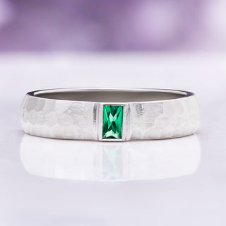 Bezel Emerald Hammered Wedding Band in Sterling Silver (5.5mm) by Aquamarise, front view showing the bezel-set emerald in the hammered band.