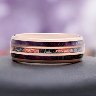 Side profile of the 8mm rose gold tungsten band with black opal inlay