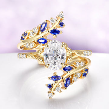 Lab-Grown Diamond & Sapphire Leaf Engagement Ring Set in 14K Solid Yellow Gold (IGI Certified), featuring blue sapphires and diamonds in a nature-inspired design by Aquamarise Gold.
