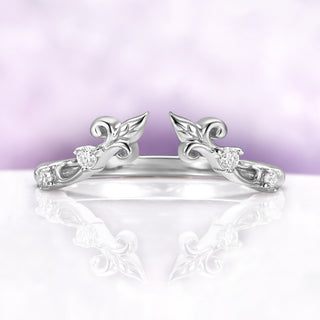 The Carmilla enhancer band on its own, an open leaf and vine wrap set with moissanite in sterling silver
