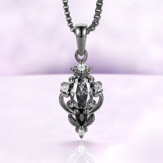 Carmilla gray moissanite pendant necklace in black ruthenium, oval center with a black onyx pear on a box chain