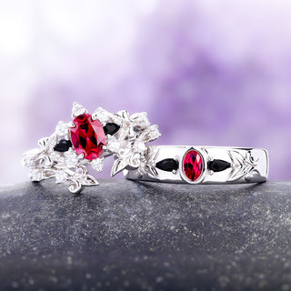 The ruby and black onyx 6mm band shown with the matching Carmilla women's bridal set as a couples ring set