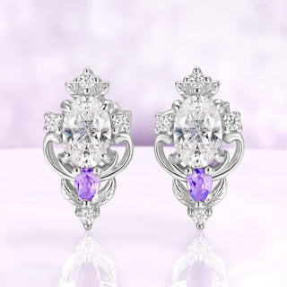 Carmilla moissanite stud earrings in sterling silver, oval centers with natural amethyst pears and carved leaf and scroll frames