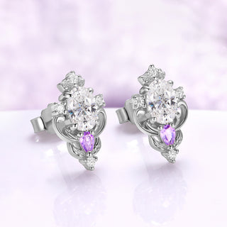 Angled view of the Carmilla moissanite and amethyst studs showing the butterfly push-backs and violet amethyst drop