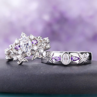 Angled view of the Carmilla moissanite and amethyst couples ring set showing the carved leaf shoulders on all three sterling silver rings