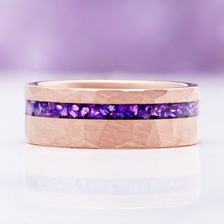 Flat profile of the 8mm amethyst inlay band against white, showing the hammered rose gold facets