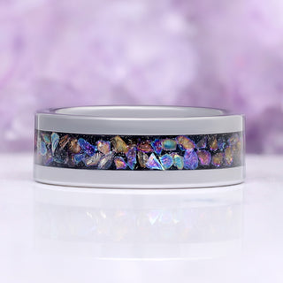 Crushed Rainbow Men's Wedding Band in Black Tungsten Carbide (8mm) by Aquamarise, showing the full rainbow opal inlay channel.