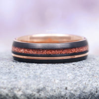Solar Flare Orange Sandstone Wedding Band- 6MM Rose Gold/ Black Tungsten featuring a striking crushed orange sandstone inlay framed by polished rose gold and matte black tungsten edges, crafted by Aquamarise.