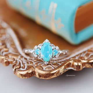 Esme Opalescent Blue Sapphire Mermaid Ring in 925 Sterling Silver