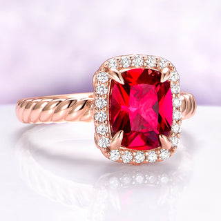 Ruby Engagement Ring Cushion Cut Ruby Halo Ring on light purple background
