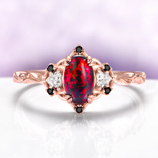 Esme Black Fire Opal & Onyx Ring in 14K Rose Gold Vermeil by Aquamarise, featuring a fiery opal center with black onyx and diamond accents in a fantasy-inspired rose gold design.