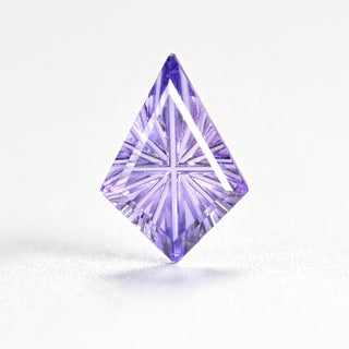 Faelight Cut lab-grown lavender purple sapphire kite 7 x 10 mm loose gemstone, concave starburst facets, on white