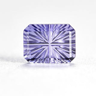 Faelight Cut lab-grown lavender purple sapphire rectangle 6 x 8 mm loose gemstone, concave starburst facets, on white