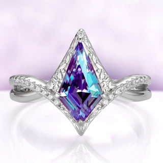 Faelyn Kite Lab-Grown Alexandrite Fairy Engagement Ring in Sterling Silver by Aquamarise, violet and teal kite stone in a carved silver halo on a crossover band