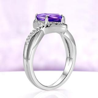 Side profile of the Faelyn alexandrite ring in sterling silver, the two strands of the band crossing below the kite setting