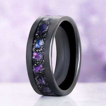 Galaxy Mother of Pearl & Meteorite Wedding Band in Black Tungsten Carbide (8mm) by Aquamarise, showing violet and blue crushed inlay set in a black band.