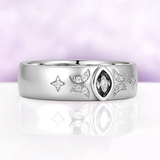 6mm sterling silver wedding band with a bezel-set marquise gray moissanite flanked by pave crescent moons and four-point stars