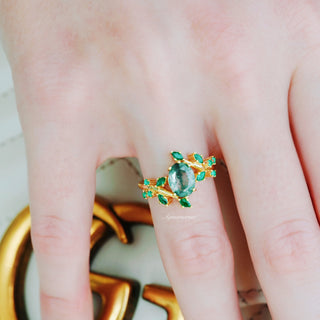 Green Moss Agate & Emerald Leaf Ring in 14K Yellow Gold on a hand