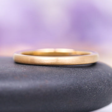 Satin Wedding Band in 14K Solid Yellow Gold (2MM) by Aquamarise Gold features a slim, elegant band with a smooth satin finish, crafted for everyday comfort and timeless style, part of solid gold rings and classic wedding bands collections.