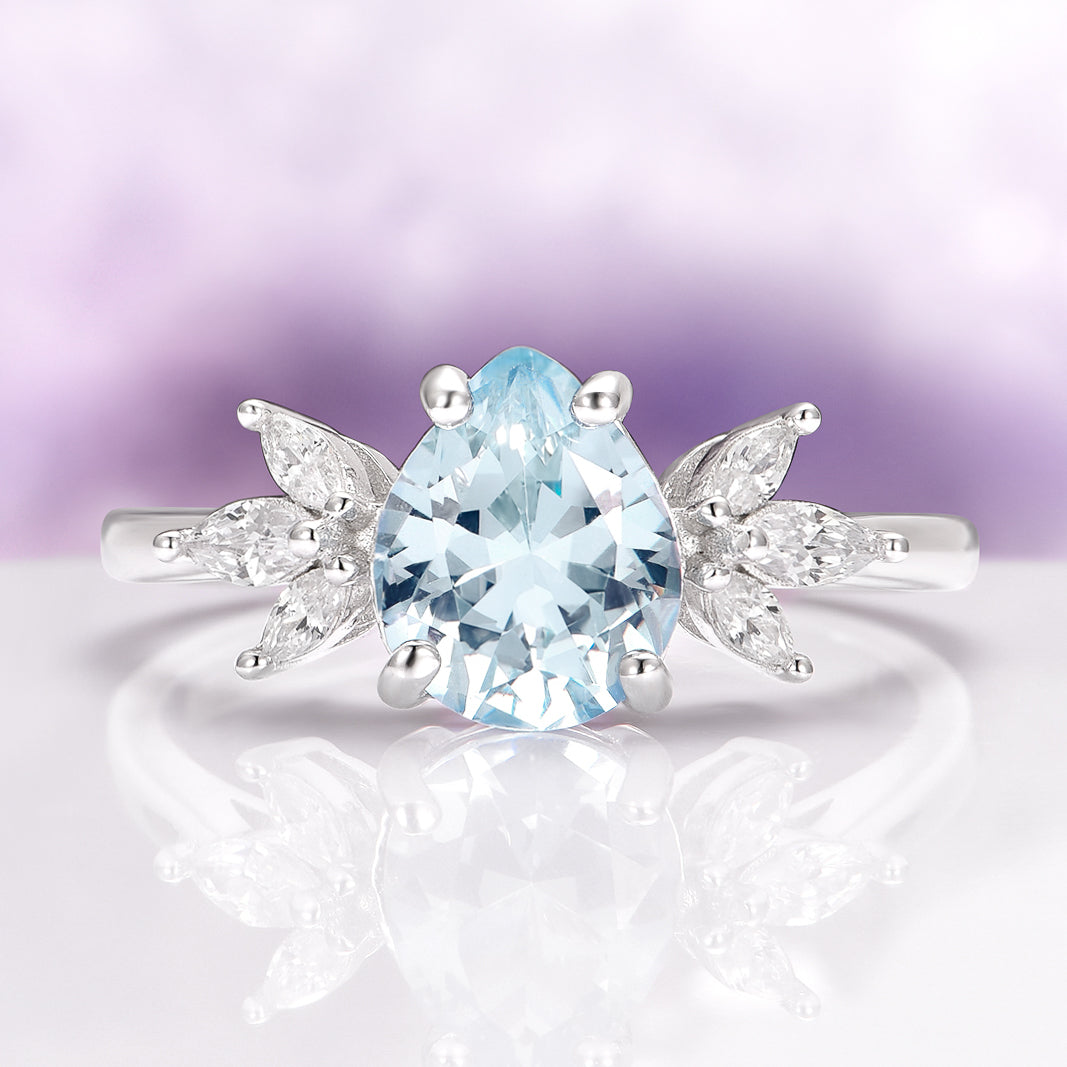 2ct lab-created aquamarine in a pear shape, accented with elegant