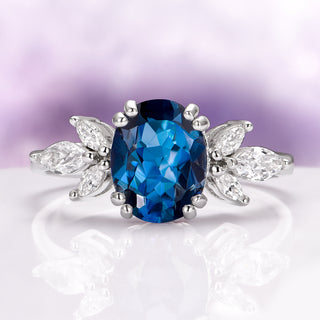 Eva London Blue Topaz Engagement Ring in Sterling Silver