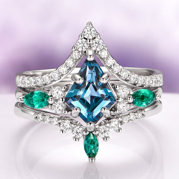 Skye Kite® London Blue Topaz & Emerald Deer Couples Ring Set by Aquamarise features a kite-shaped London Blue Topaz center stone with marquise emeralds and sparkling diamonds on a sterling silver band, part of Matching Couples' Rings and May and November Birthstone Jewelry collections.