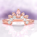 Blush Pink Morganite Stackable Wedding Band in 14K Solid Rose Gold featuring a tiara-inspired design accented with natural blush pink morganites and sparkling diamonds by Aquamarise Gold.