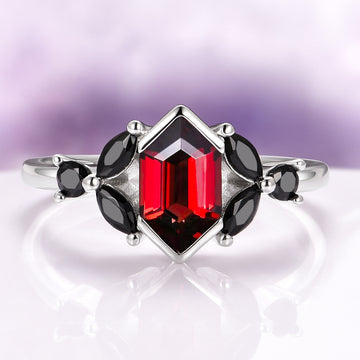 Hexagon Natural Red Garnet & Black Onyx Engagement Ring in 14K White Gold featuring a hexagon-cut red garnet center with marquise and round black onyx accents by Aquamarise Gold.