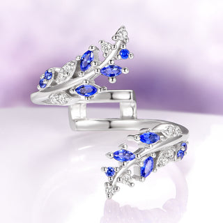 Oval Cut Moissanite & Blue Sapphire Leaf Engagement Ring Set in 14K White Gold