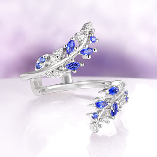 Oval Cut Moissanite & Blue Sapphire Leaf Engagement Ring Set in 14K White Gold