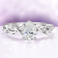 Lab-Grown Diamond Leaf Engagement Ring in 14K White Gold (IGI Certified) by Aquamarise Gold, featuring teardrop lab diamond and delicate leaf-inspired white gold band details.
