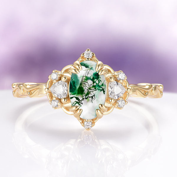 Esme Green Moss Agate Fairy Engagement Ring in 14K Solid Yellow Gold by Aquamarise Gold, featuring an oval moss agate with diamond accents and intricate yellow gold detailing.