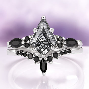 Skye Kite® Rutilated Quartz & Black Onyx Ring Set in Sterling Silver by Aquamarise, featuring kite-cut quartz with black rutile inclusions and black onyx accents in a fantasy-inspired design.