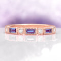 Art Deco Alexandrite Band in 14K Rose Gold Vermeil by Aquamarise, featuring alternating rectangular lab-grown Alexandrite and round cubic zirconia stones in a vintage-inspired rose gold vermeil setting.