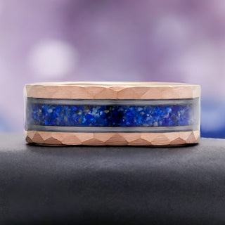 Lapis Lazuli Men's Wedding Band in Rose Gold Tungsten Carbide (8mm) by Aquamarise, a hammered rose gold band with a deep blue lapis inlay.