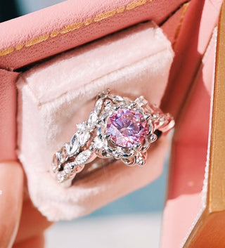 Luxury pink diamond ring in a pink jewelry box
