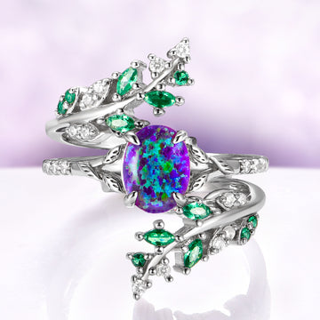 Lavender Fire Opal & Emerald Leaf Couples Ring Set featuring a sterling silver band with vibrant purple opal center and emerald leaf accents by Aquamarise, unique matching couples rings.