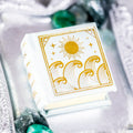 Summer Court Handmade Leather Book Ring Box- Seaglass Glow Edition (Small) in pale sea-green leather with gold sun and wave design by Aquamarise from Handmade Book Ring Boxes collection.