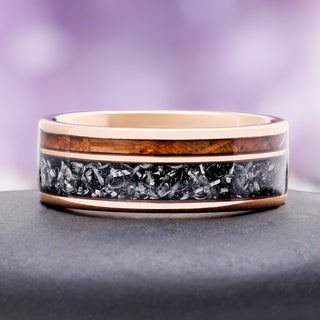 Whiskey barrel and meteorite band on slate, showing the grain of the reclaimed oak inlay
