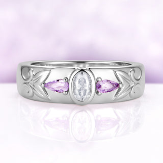 Men's 6mm sterling silver wedding band with a bezel-set oval moissanite between two natural amethyst pears and carved leaf shoulders